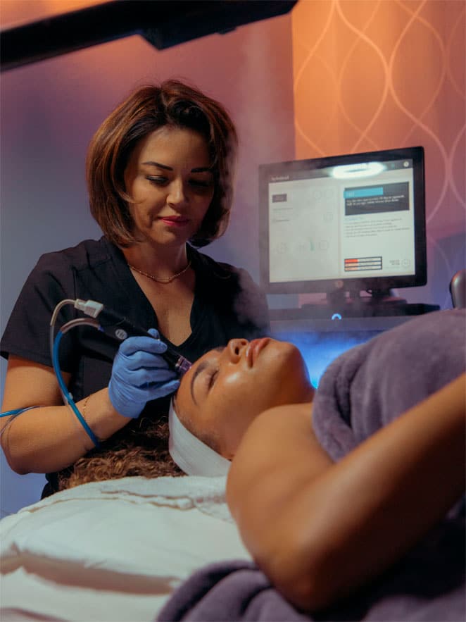 HydraFacial treatment in progress at Infini Cosmetic Associates Scottsdale